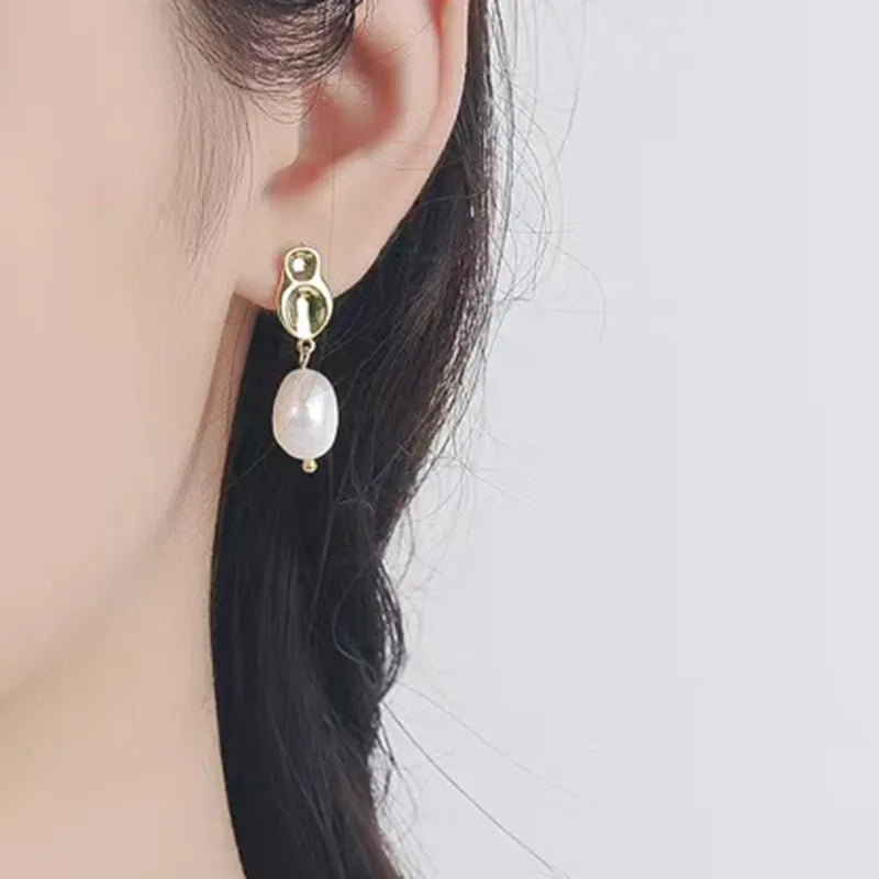 Gleaming Pearl Dangles